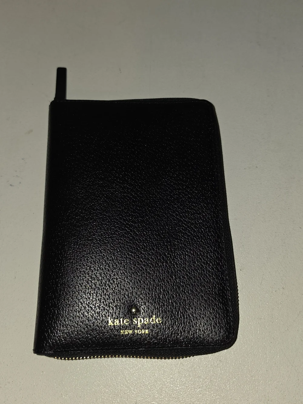 black pebbled leather Kate Spade Wellesley zip-around personal organizer